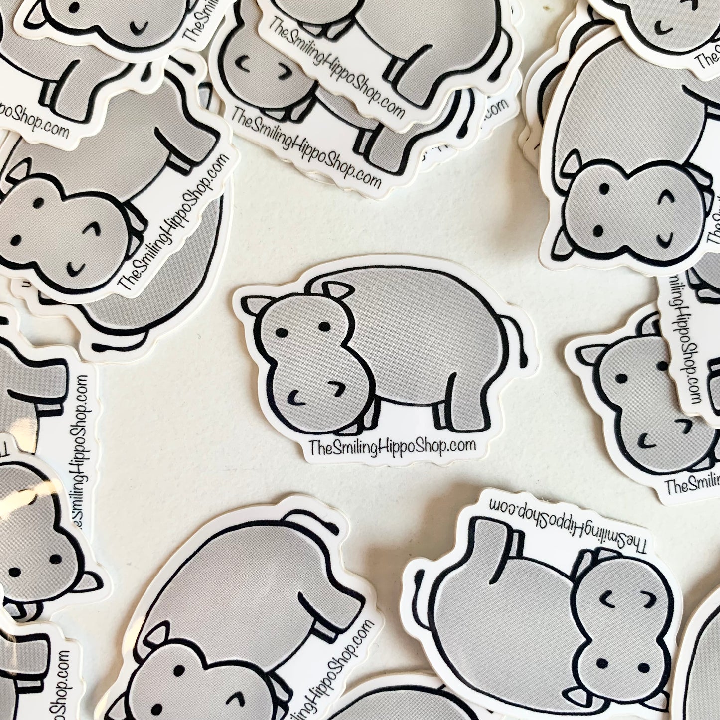 The Smiling Hippo 1x1.5in sticker