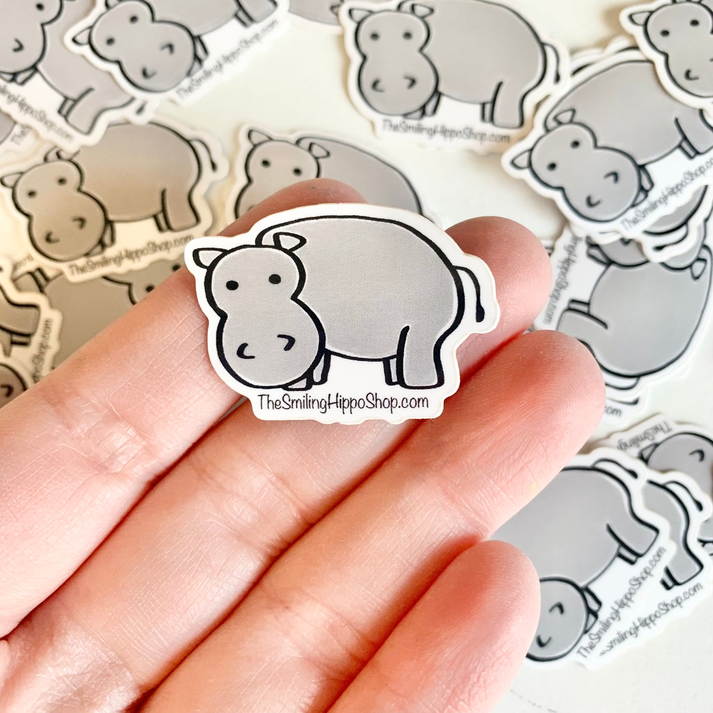 The Smiling Hippo 1x1.5in sticker